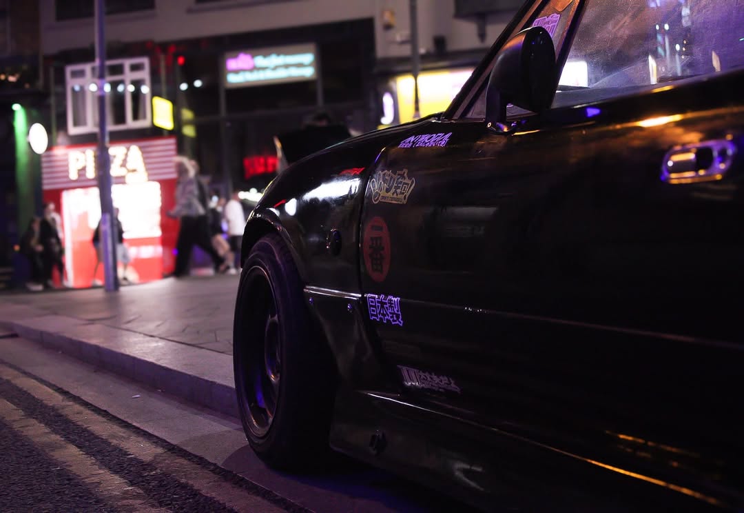 Black Mazda MX-5 on a Liverpool street at night — T&DSHOTS